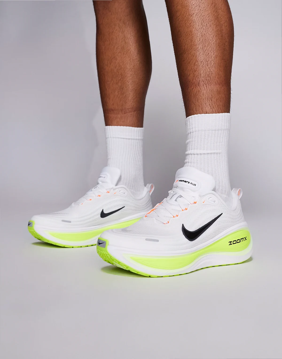 Vomero Plus sneakers in white and neon green