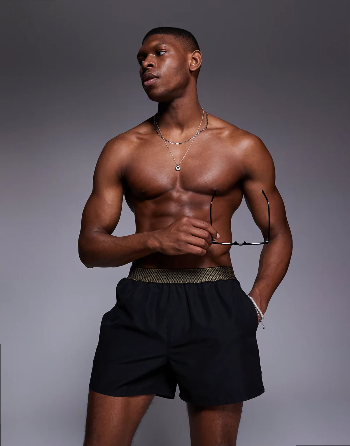 swim shorts in short length with elastic waistband detail in black