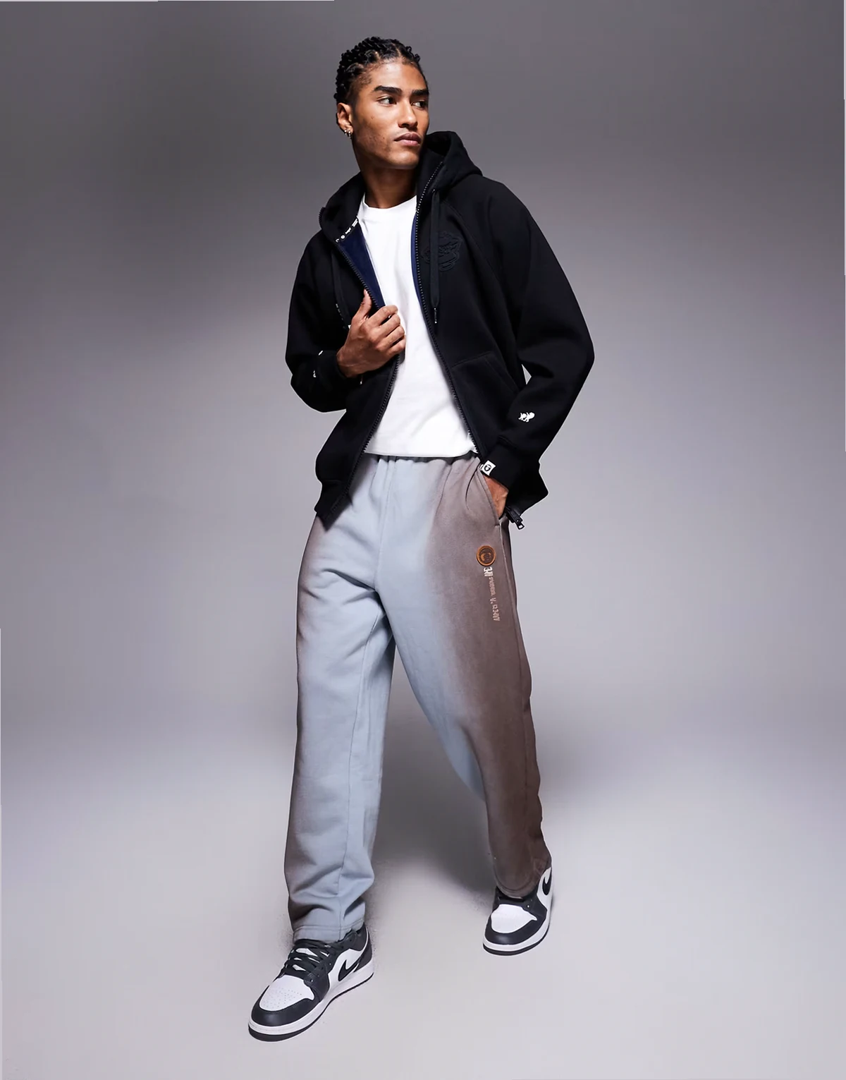 Aape by A Bathing Ape loose fit sweatpants in washed blue with leg embroidery