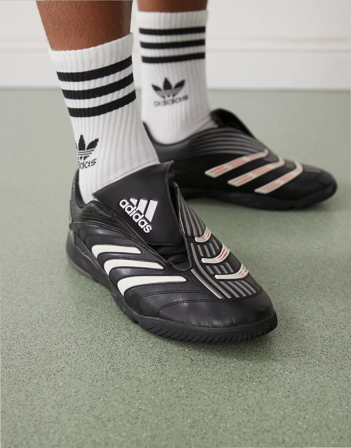 Predator Sala sneakers in black and silver