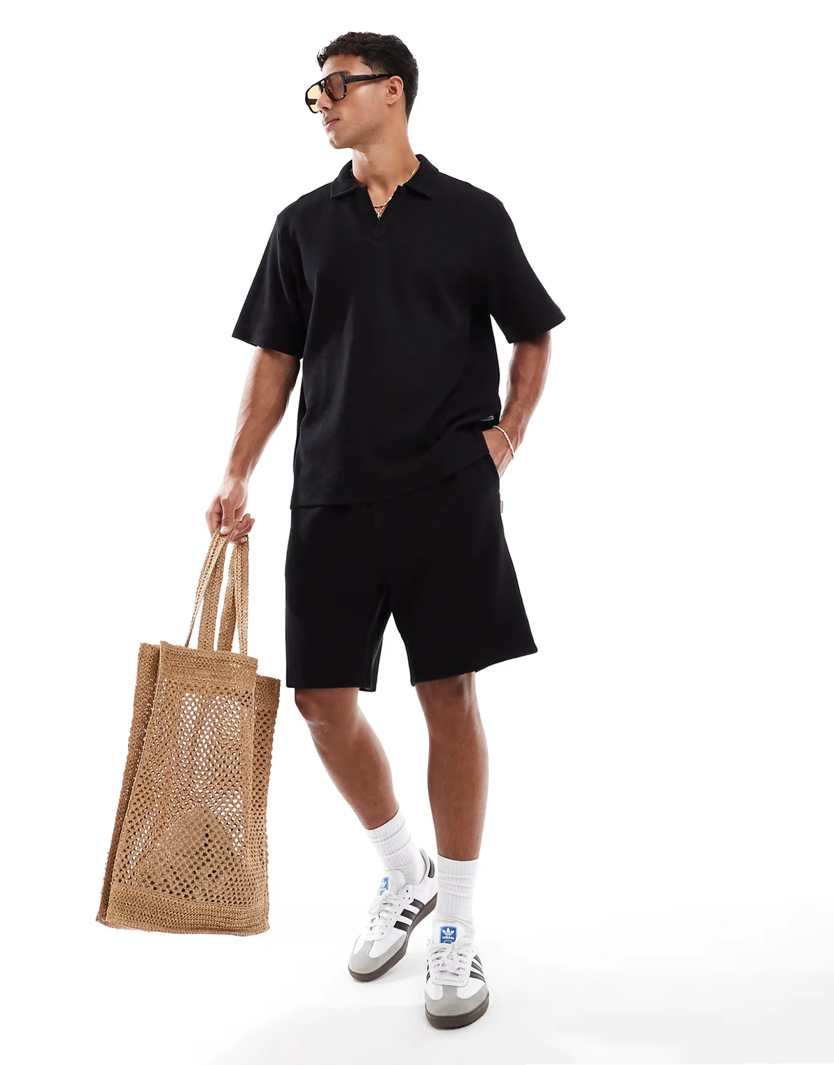 textured open neck polo shirt and shorts set in black
