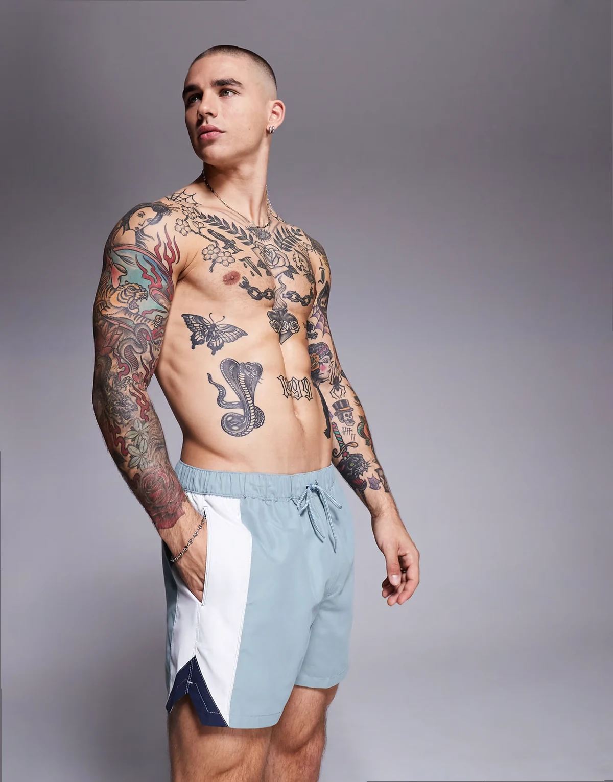 swim shorts in short length with side vent cut and sew in blue