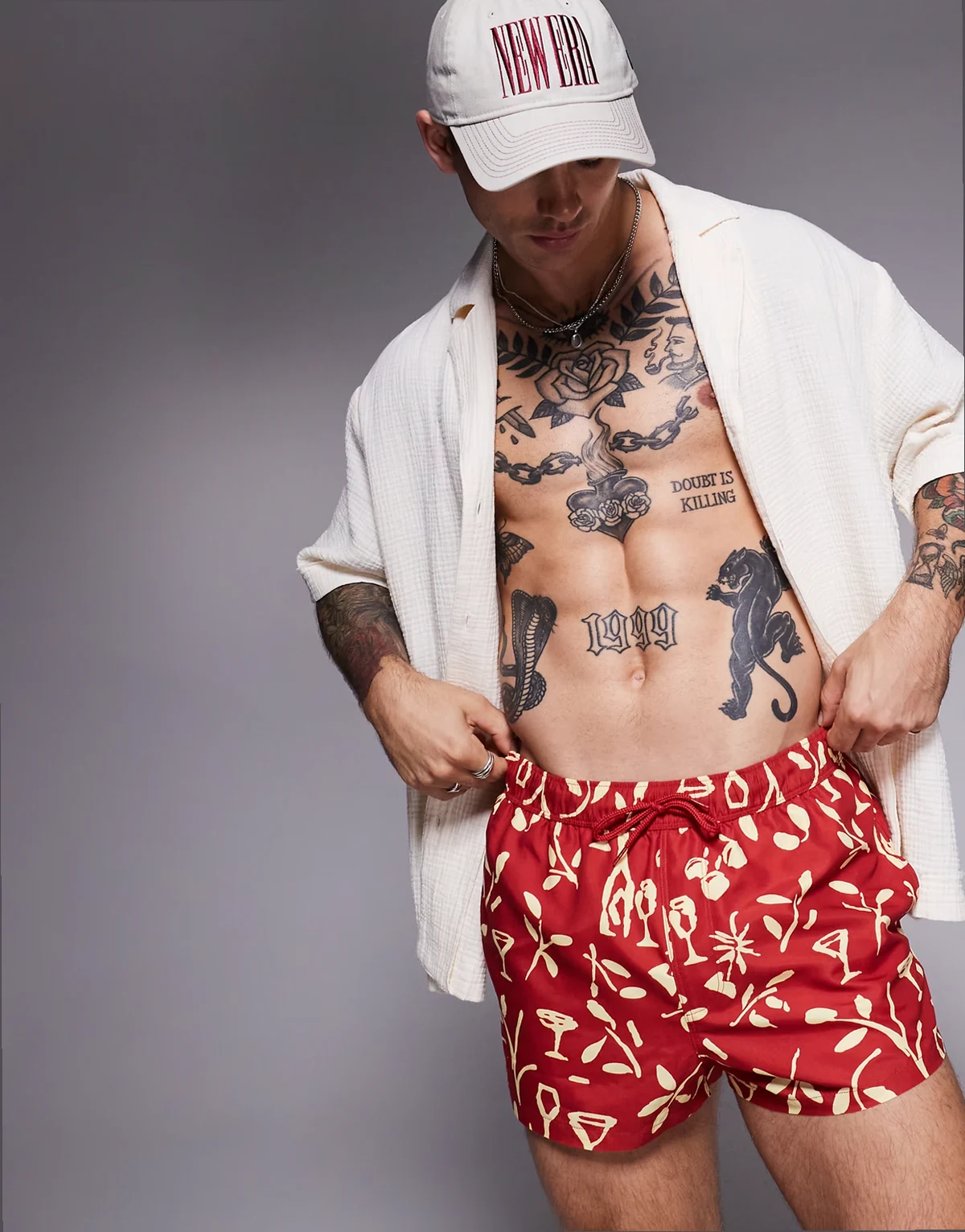 swim shorts in super short length in red floral print