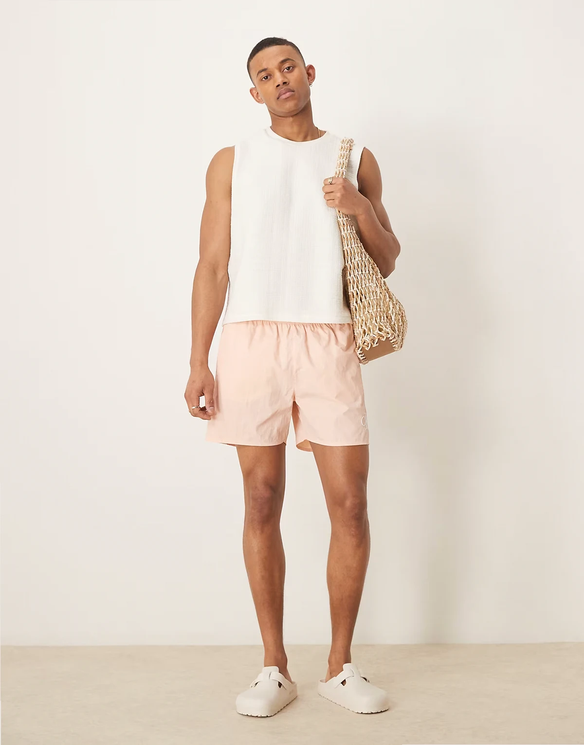 – Badeshorts in Pfirsichrosa mit Kordelzug und Logo