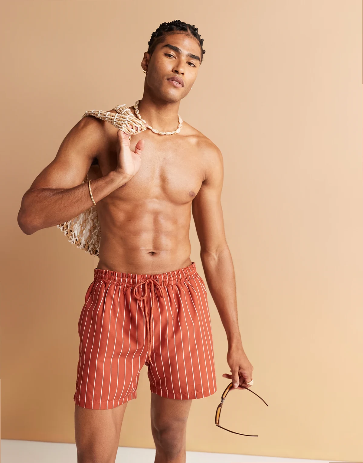 striped swim shorts in rust