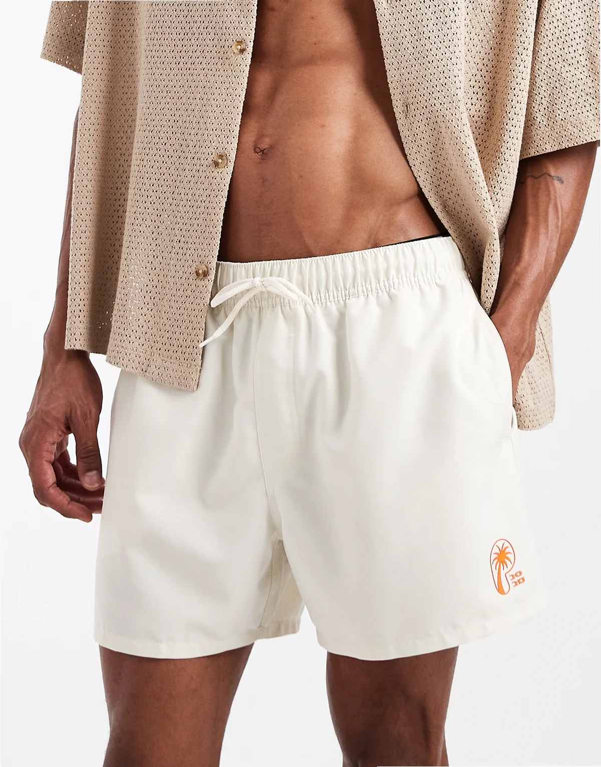 short length swim shorts with silicone placement print in cream