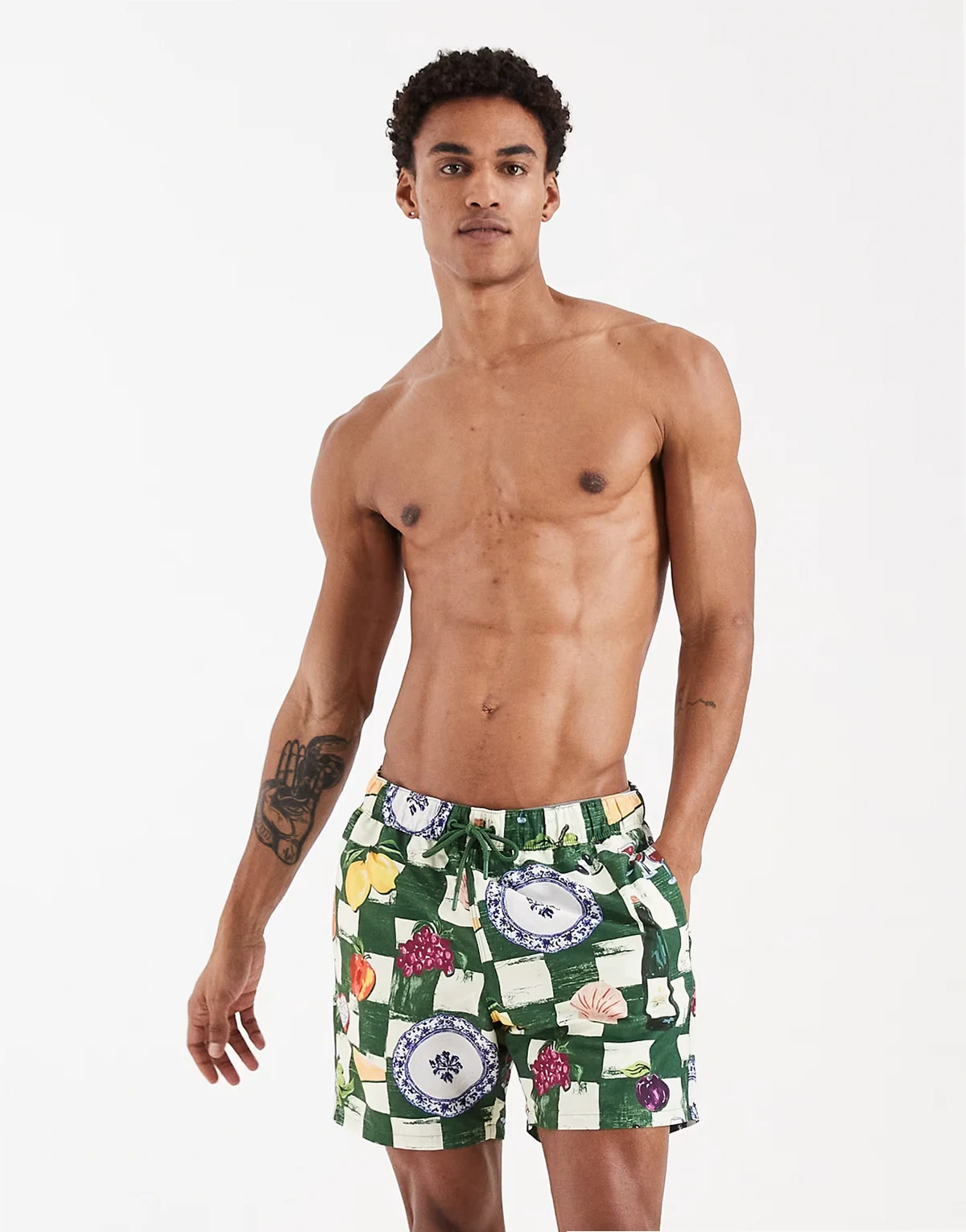 mid length swim shorts in tile fruit print