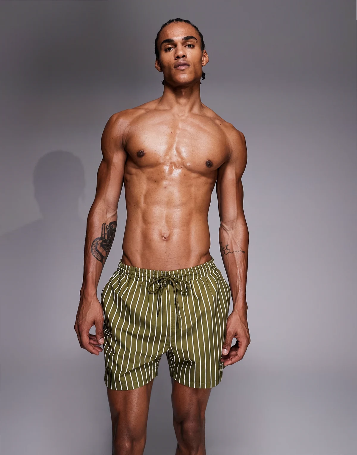 striped swim shorts in olive