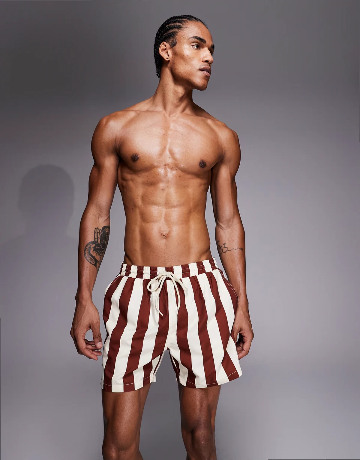 striped swim shorts in brown and beige