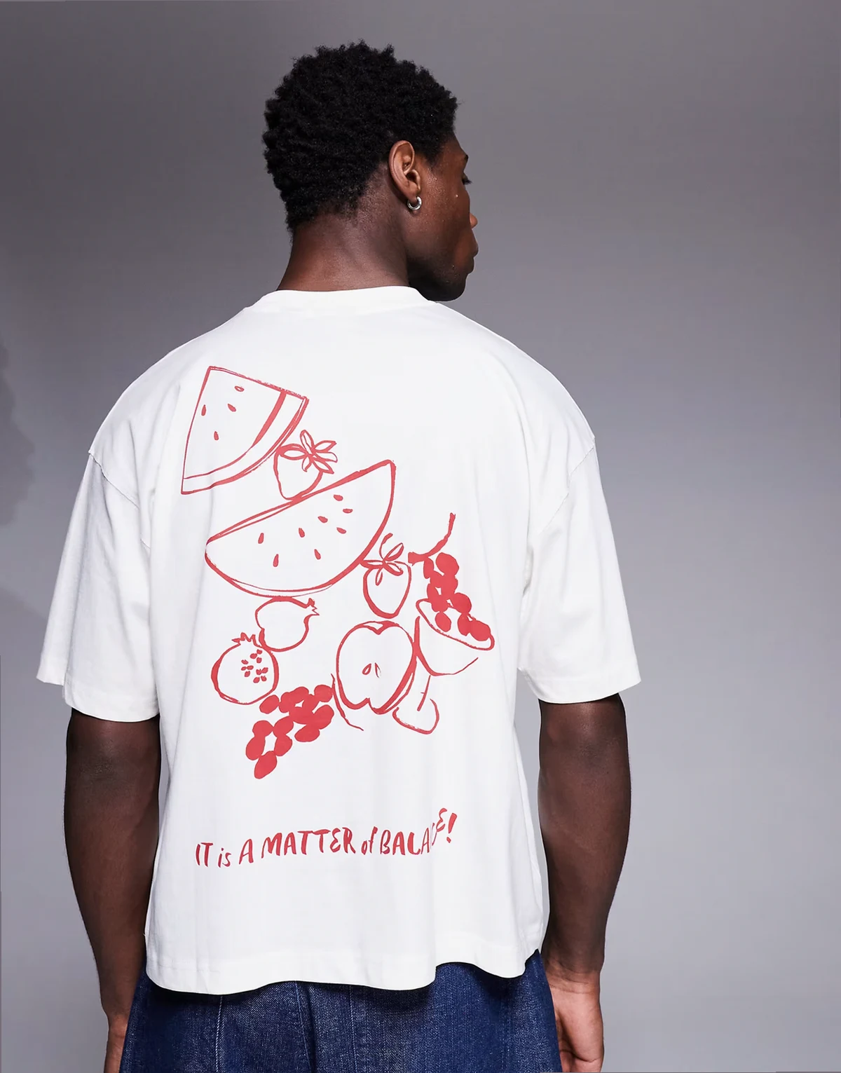 – Kastiges Oversize-T-Shirt in Wollweiß mit Sommer-Print
