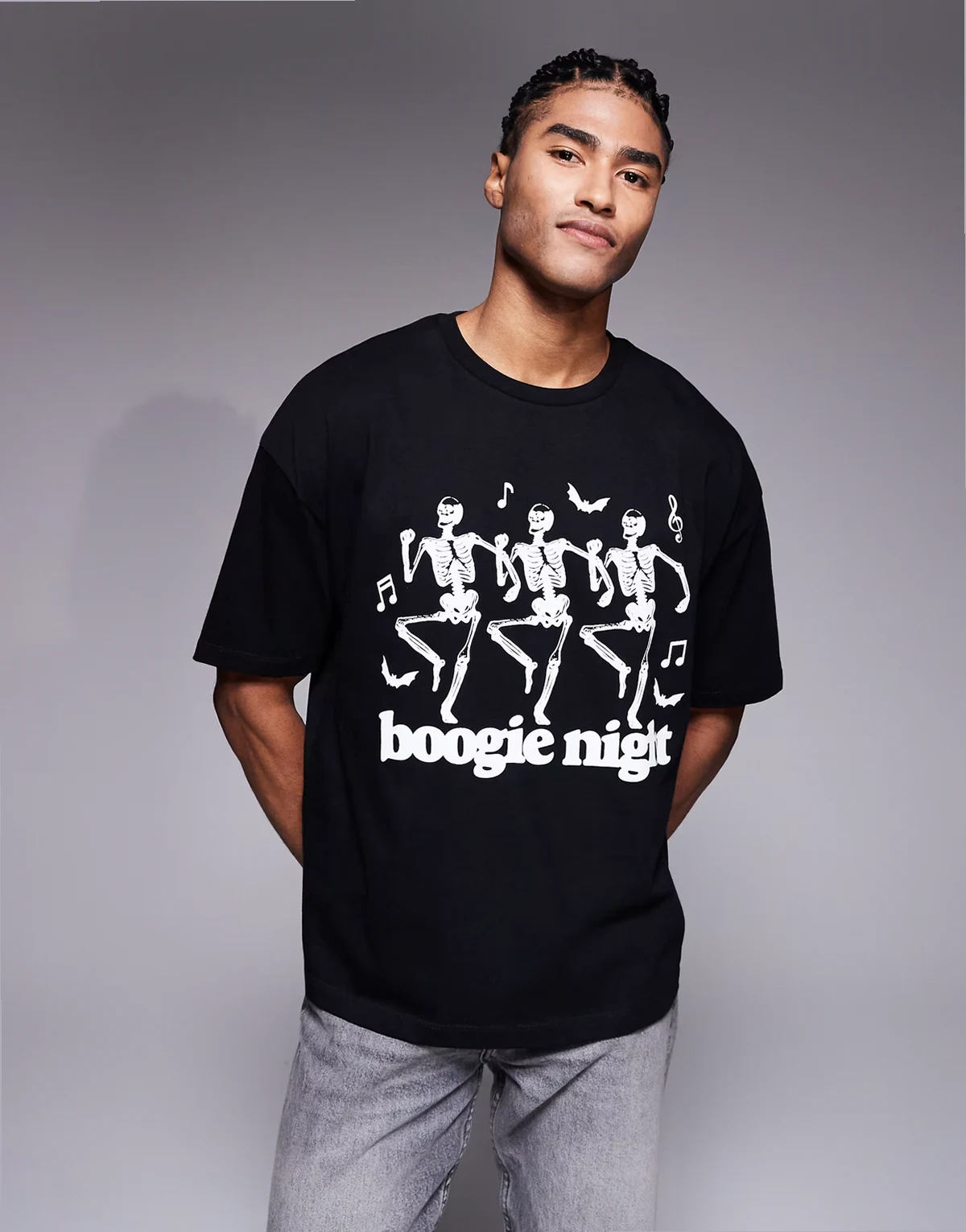 – Kastiges Oversize-T-Shirt in Schwarz mit Tanzende-Skelette-Grafikprint
