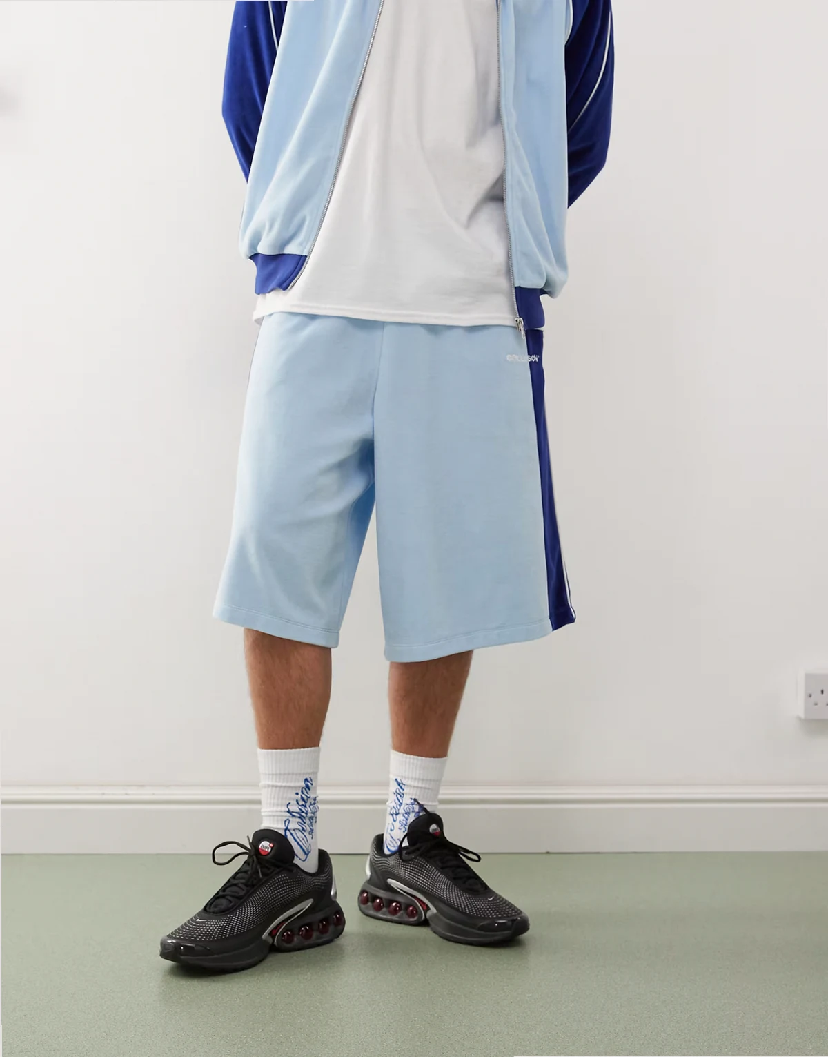 velour paneled shorts in blue - part of a set
