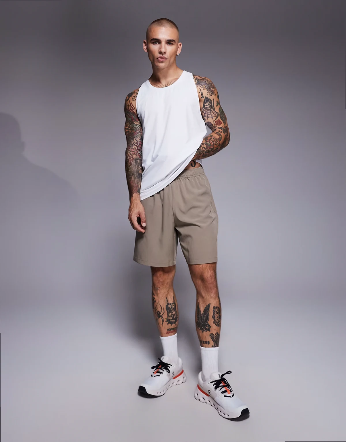 Icon 7-inch quick dry training shorts with zip pockets in stone gray