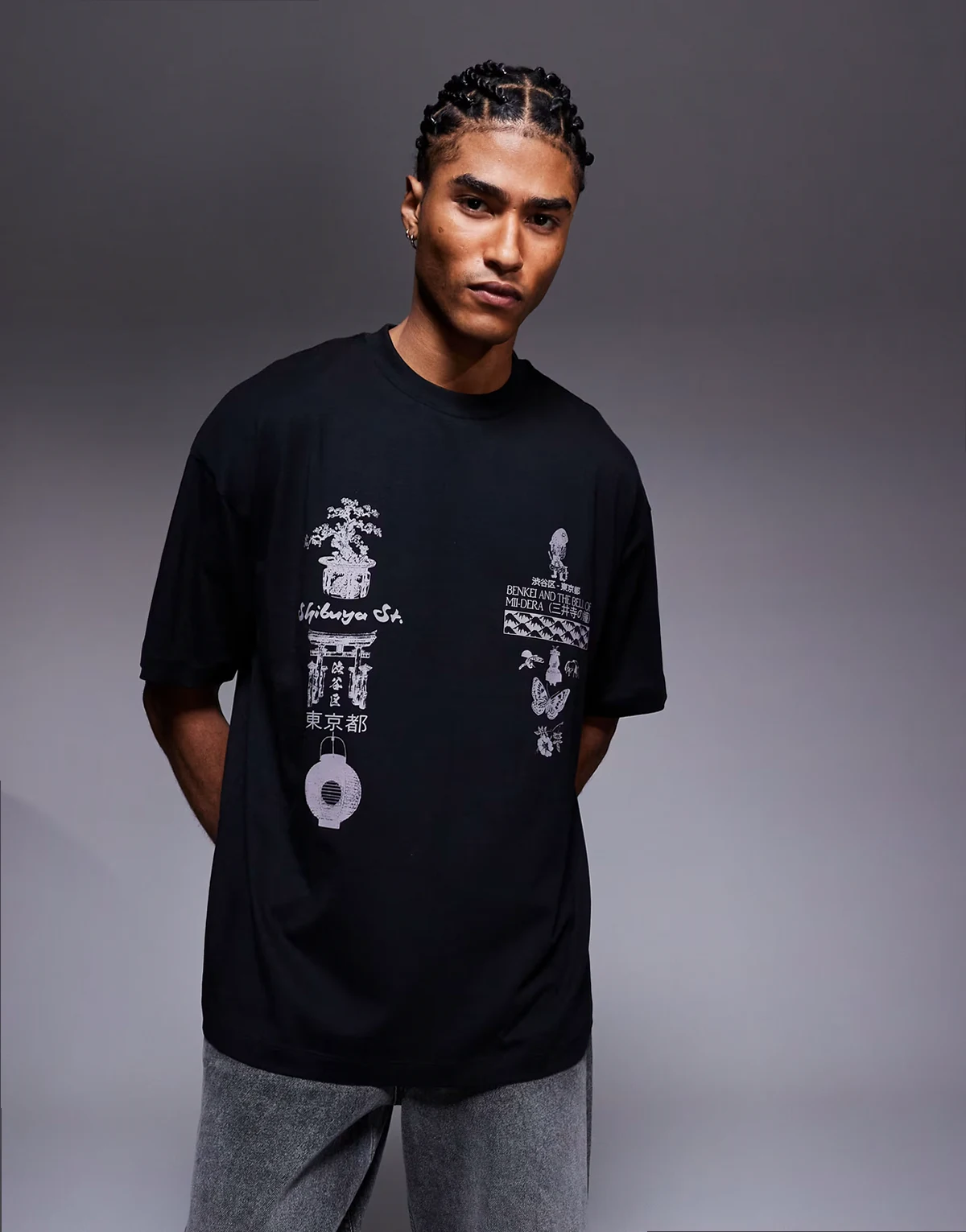 – Oversize-T-Shirt in Schwarz mit verschiedenen Grafikprints