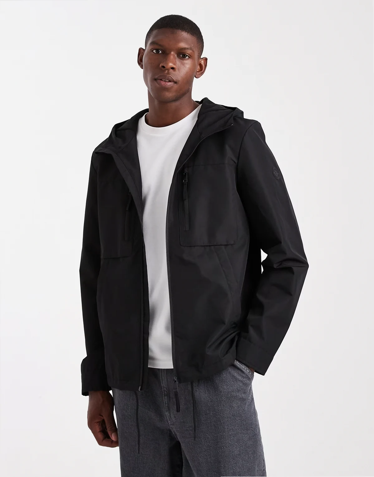 short hooded windbreaker jacket with pocket detail in black