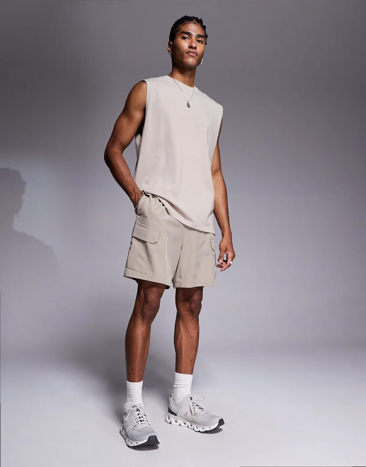 Icon 7-inch quick dry training cargo shorts with zip pockets in stone