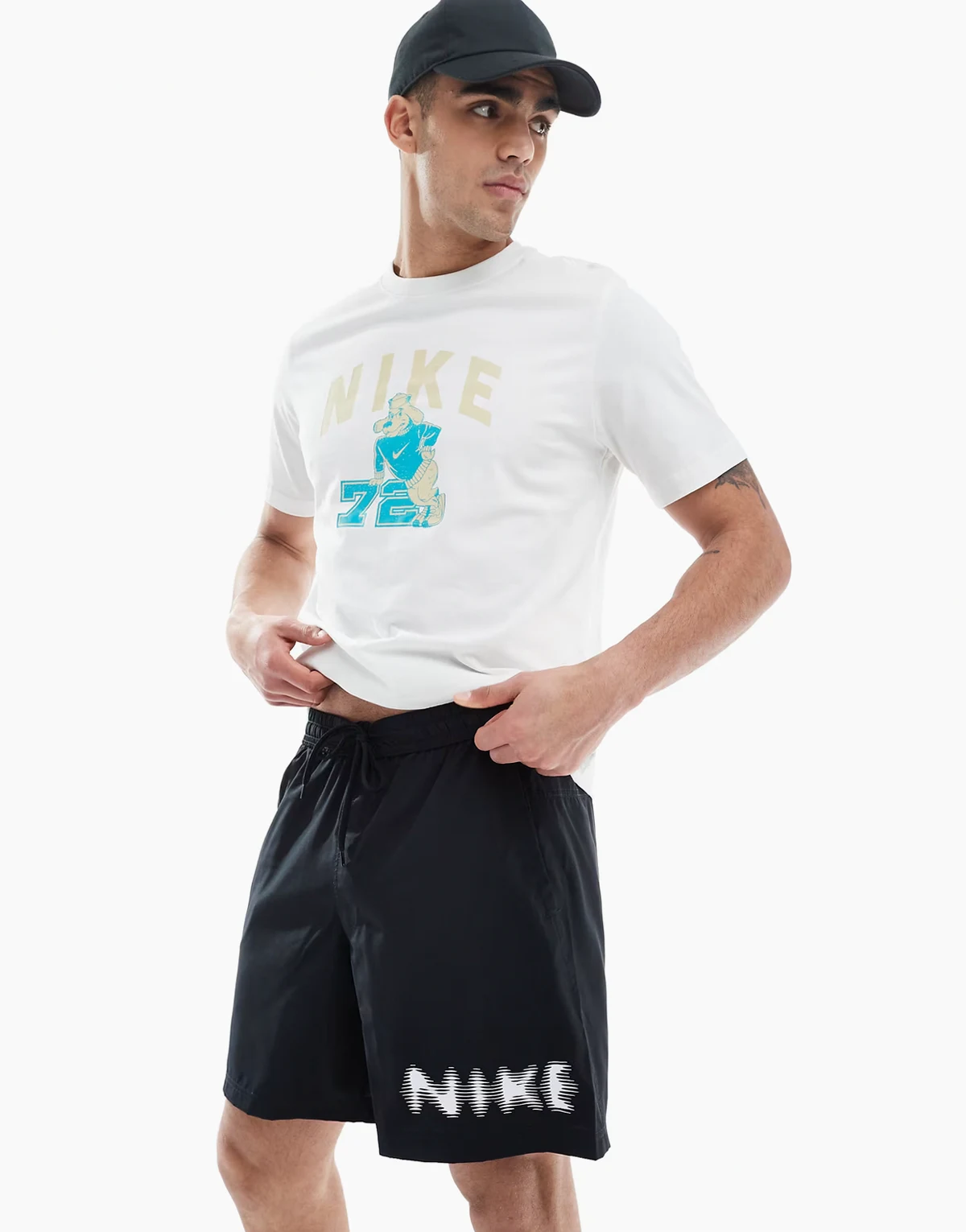 blurred swoosh graphic 7 inch shorts in black