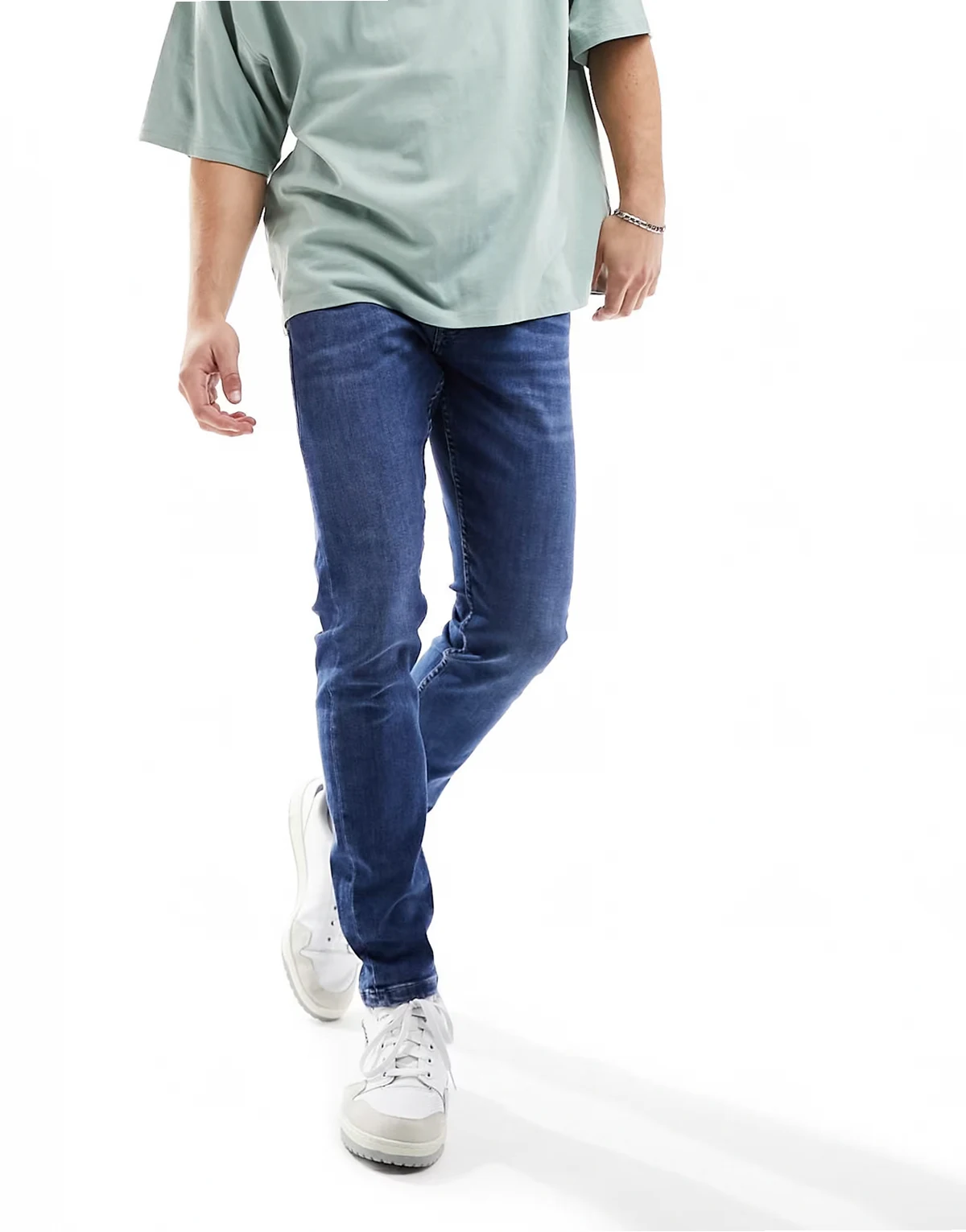 warp skinny fit jeans in mid wash