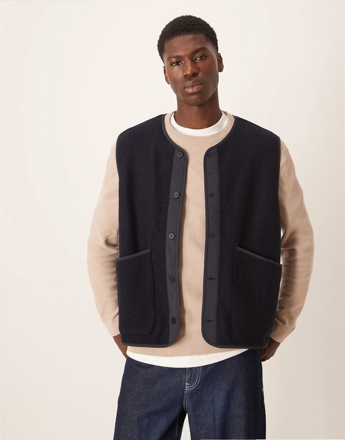 boiled wool tank top in navy blue with contrast edging