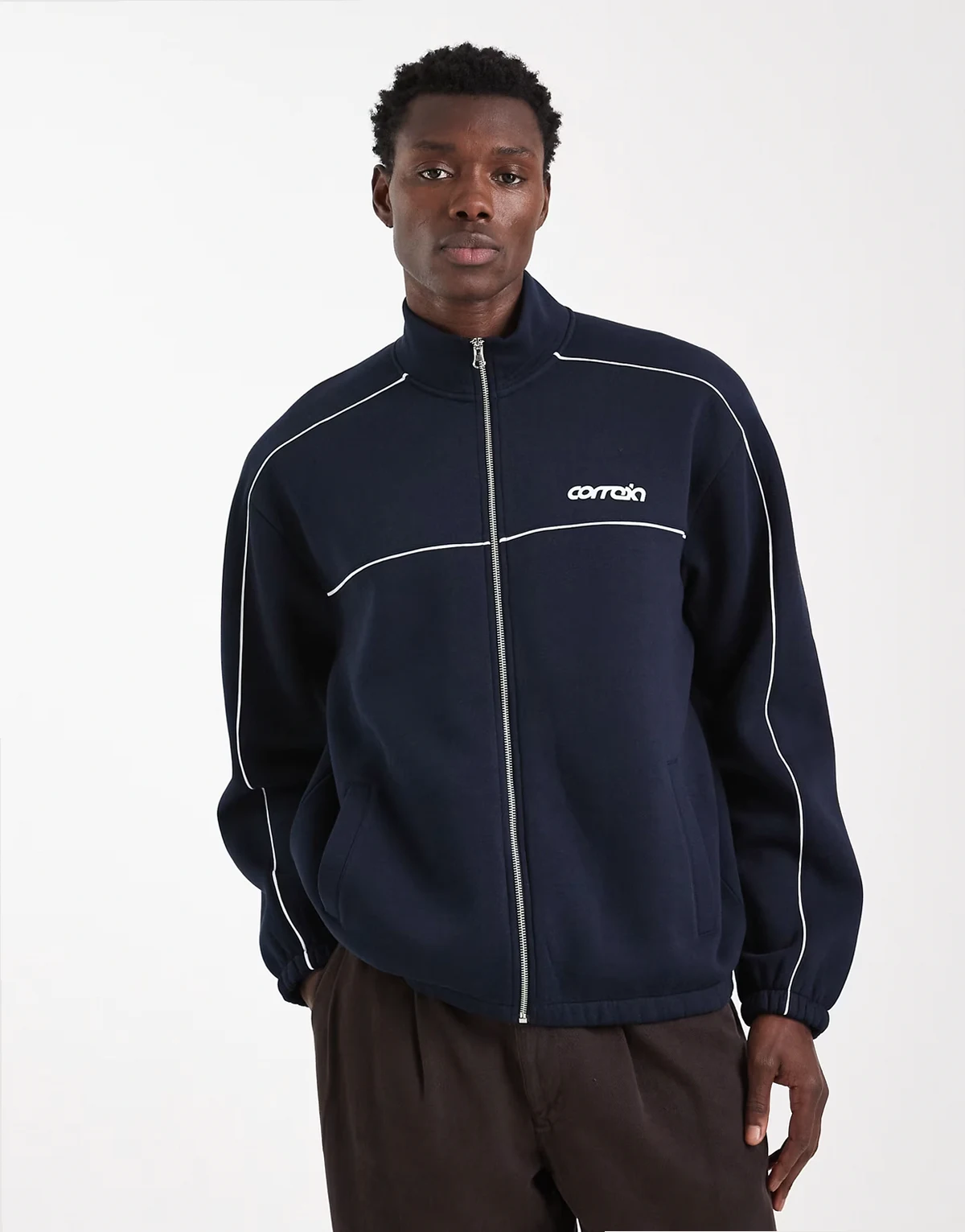 – Relaxed-Fit-Trainingsjacke in Marineblau mit Print und Paspelierung