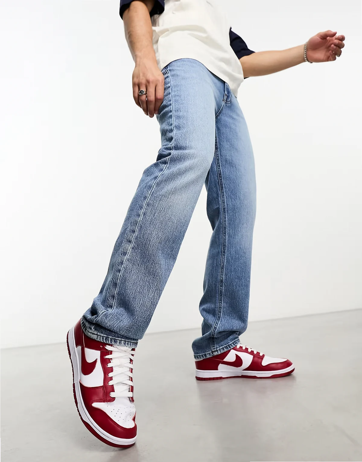 straight leg jeans with stretch in light wash blue