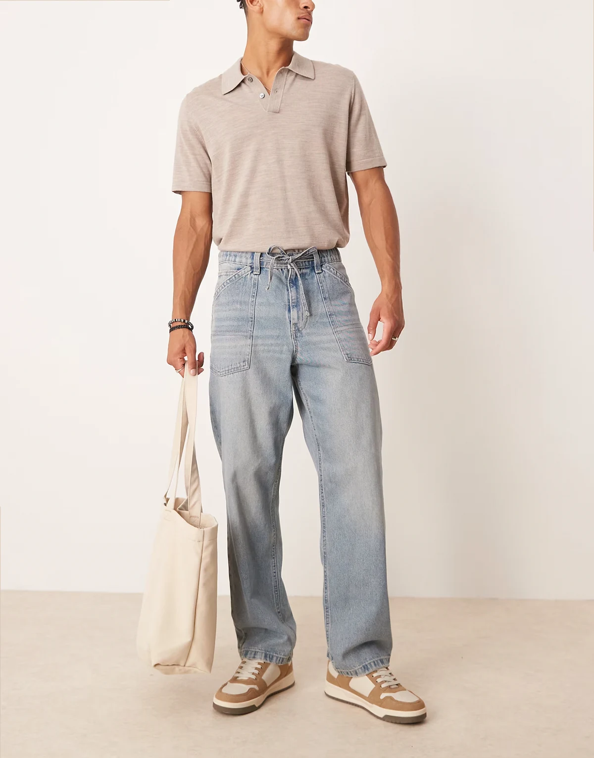 – Baggy-Jeans in hellblau getönter Waschung mit Kordelzug