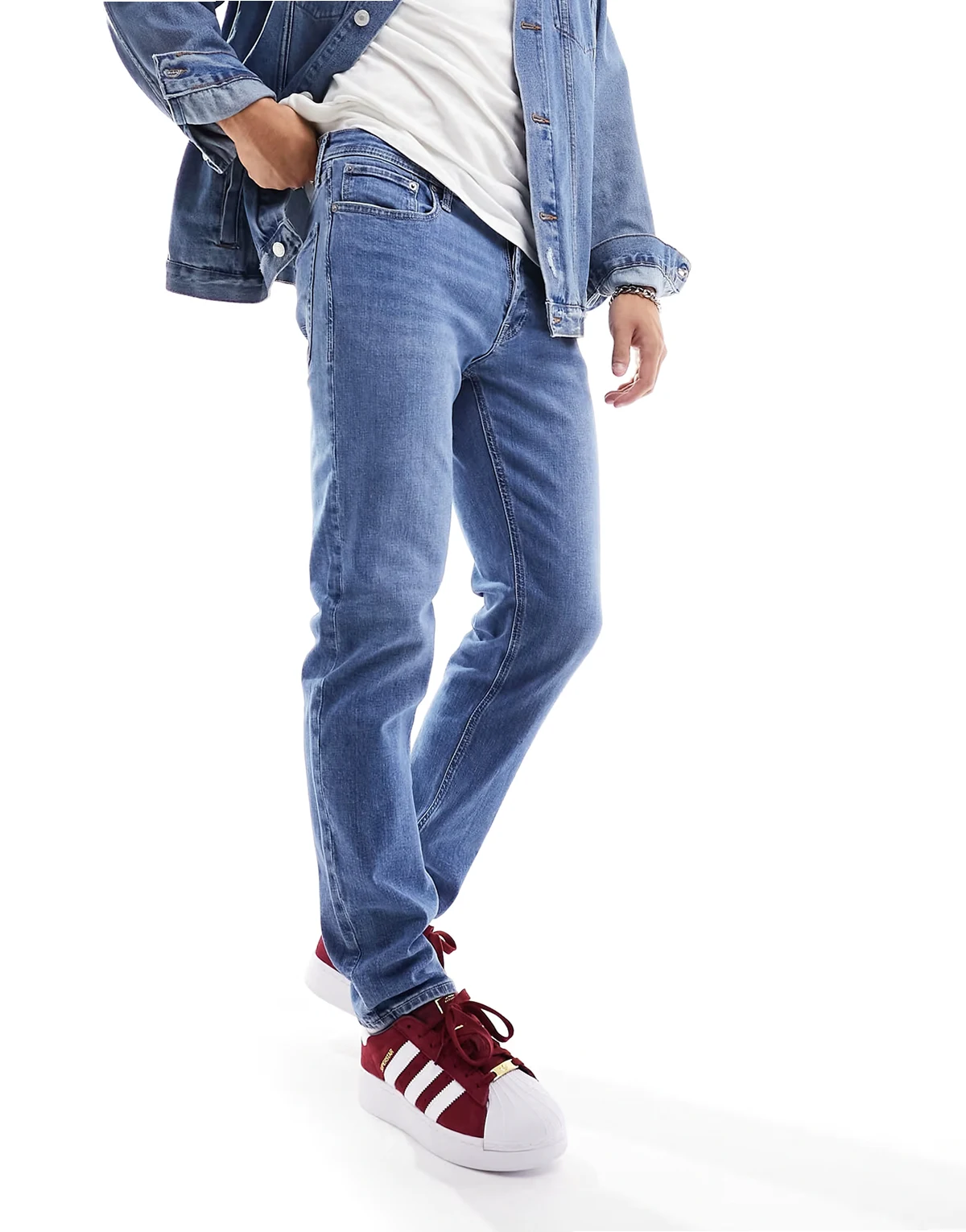 Essentials Mike tapered fit jean in light wash blue