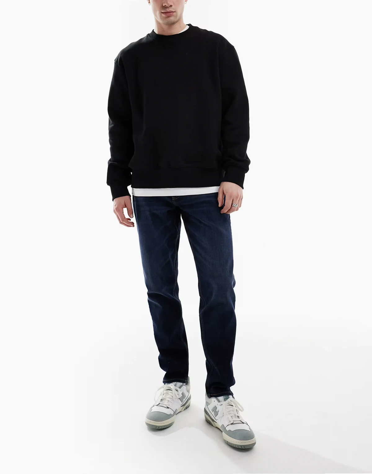 stretch tapered jeans in dark wash