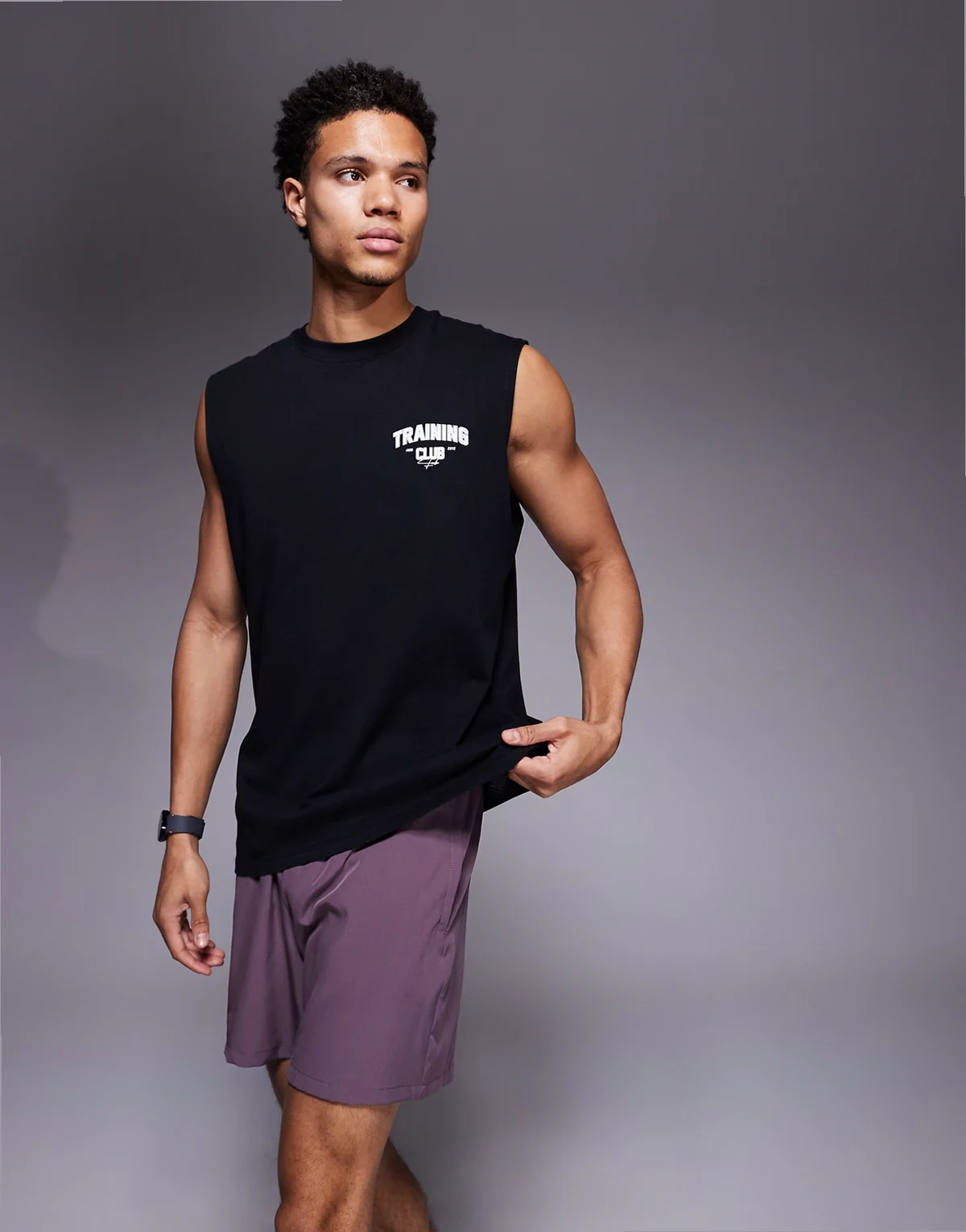cotton oversized pump training tank with chest graphic and quick dry finish in washed black