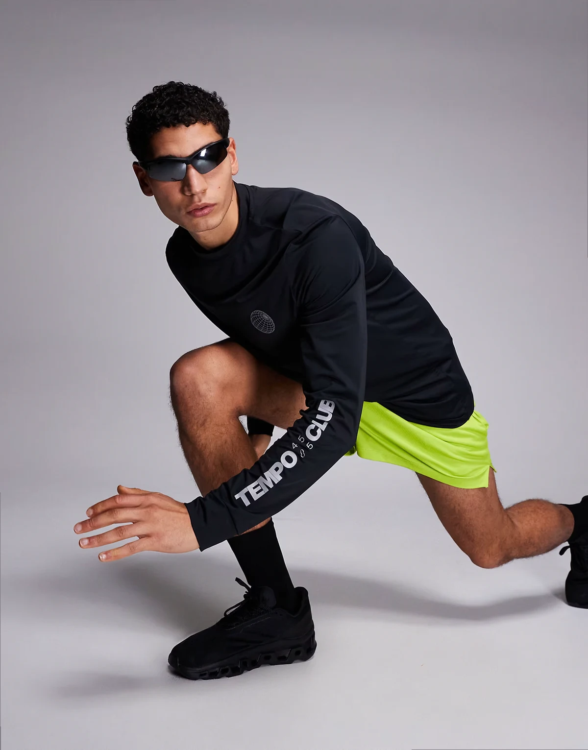 quick dry nylon performance mesh long sleeve running t-shirt with reflective graphic in black