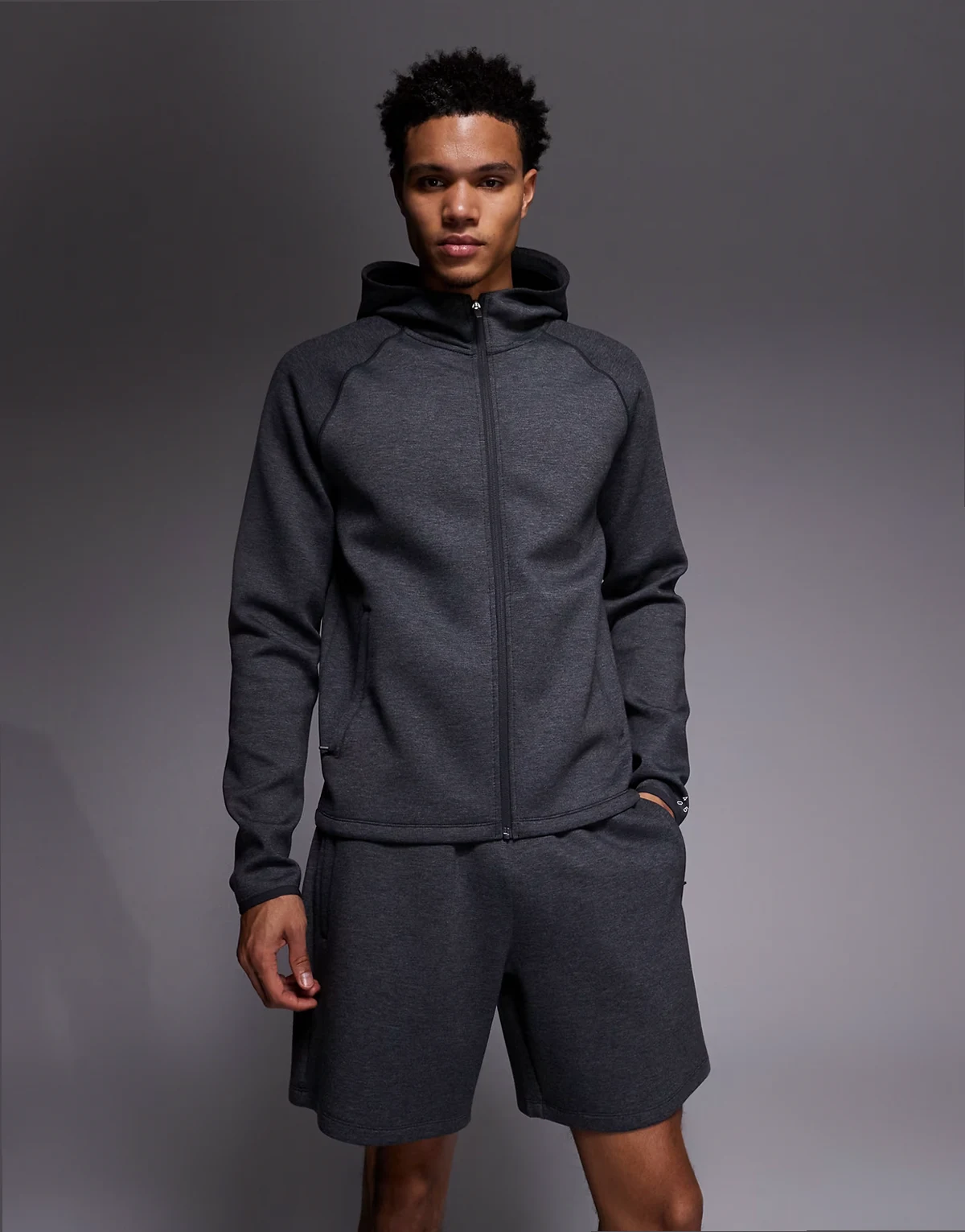 – Sweat-Shorts aus Material in Neoprenoptik in meliertem Anthrazit mit Reißverschlusstaschen