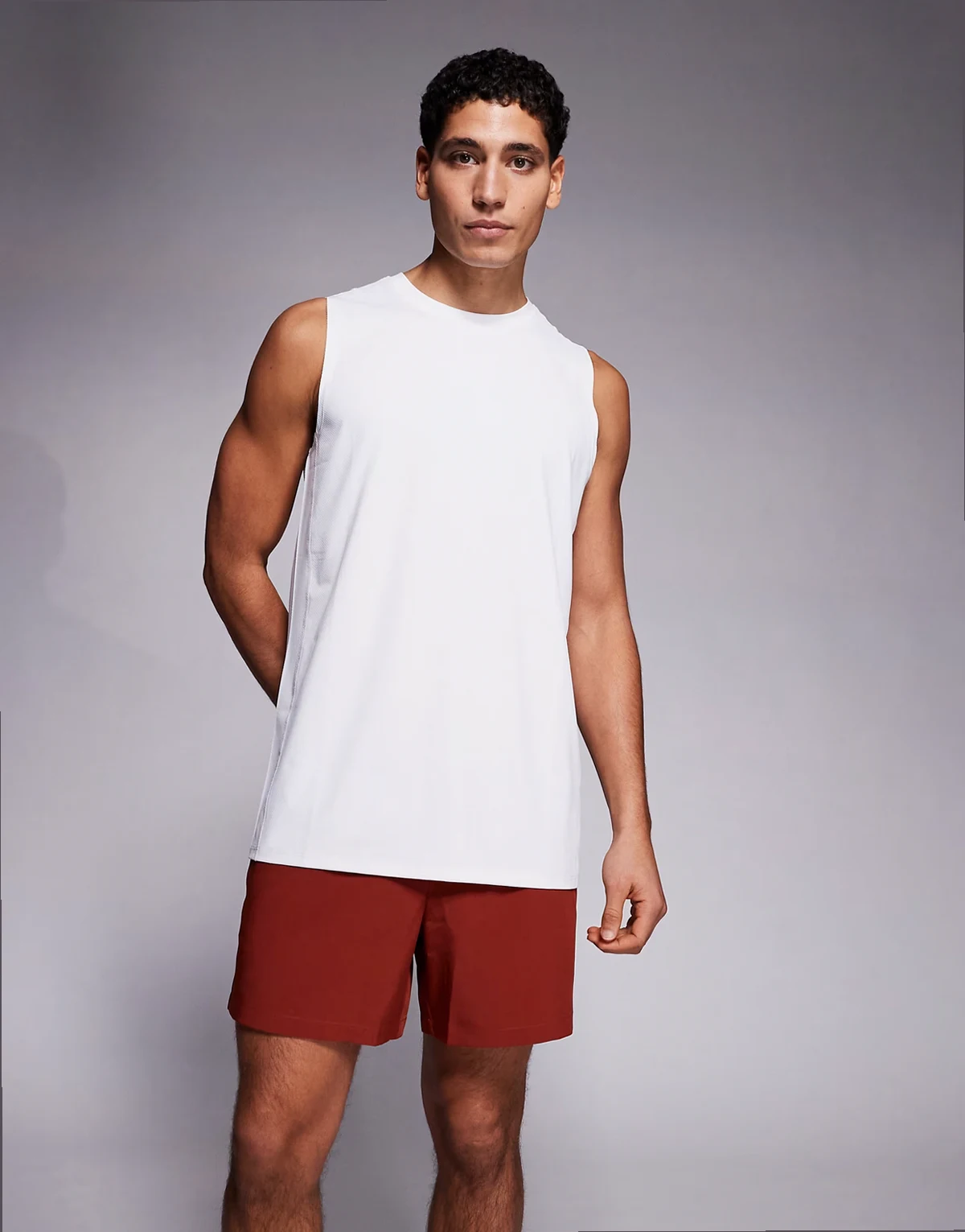 – Icon – Rdzawe szybkoschnące szorty treningowe o długości 13 cm z zapinanymi na zamek kieszeniami