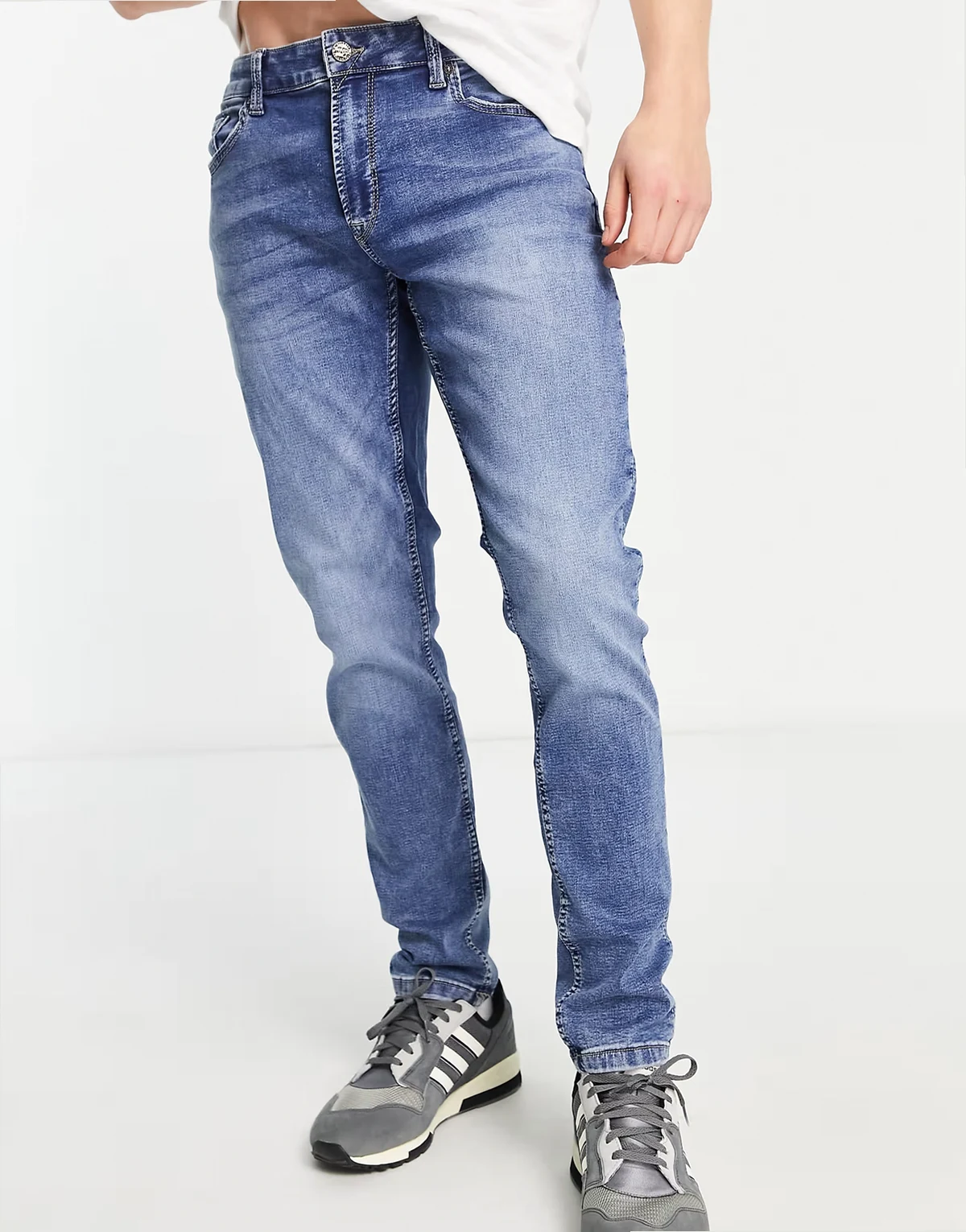 jog jeans in slim fit mid blue
