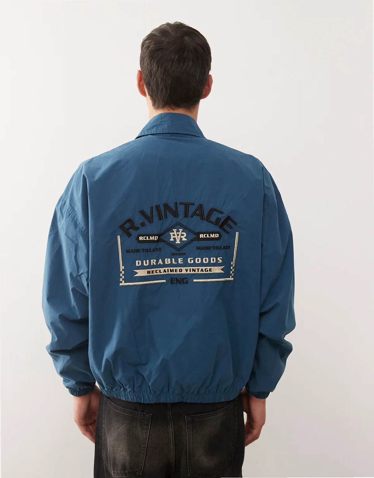 – Harrington-Bomberjacke in Tintenblau mit Stickerei am Rücken