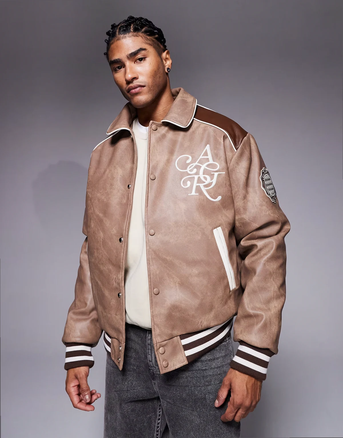 marbled effect faux leather varsity jacket in brown