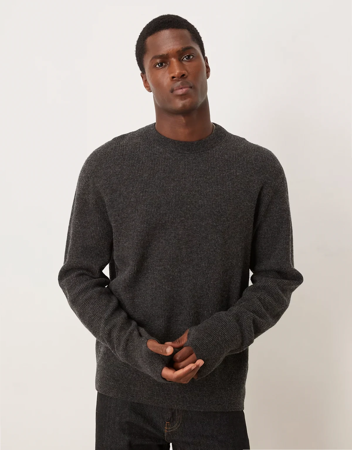 wool rich crew neck ribbed sweater with wrist gaiters and thumb holes in dark gray