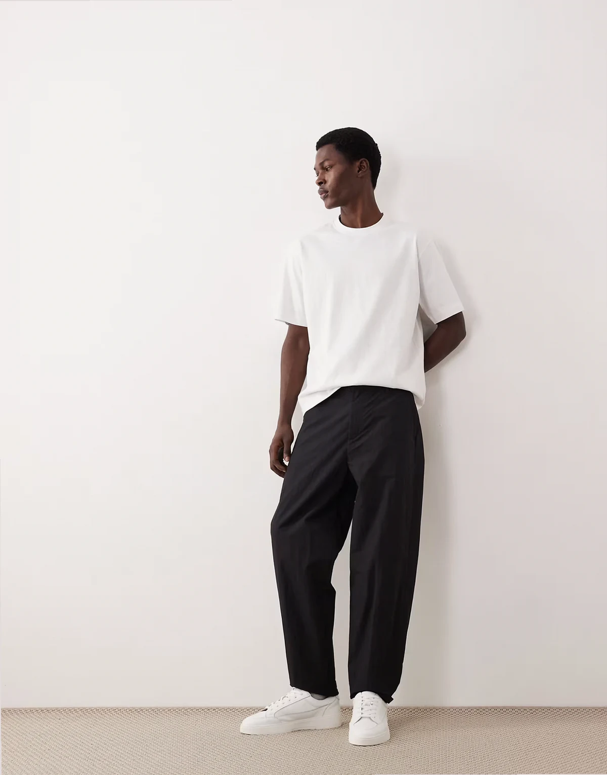 AC-B-252 carrot fit cotton-nylon blend chinos in black