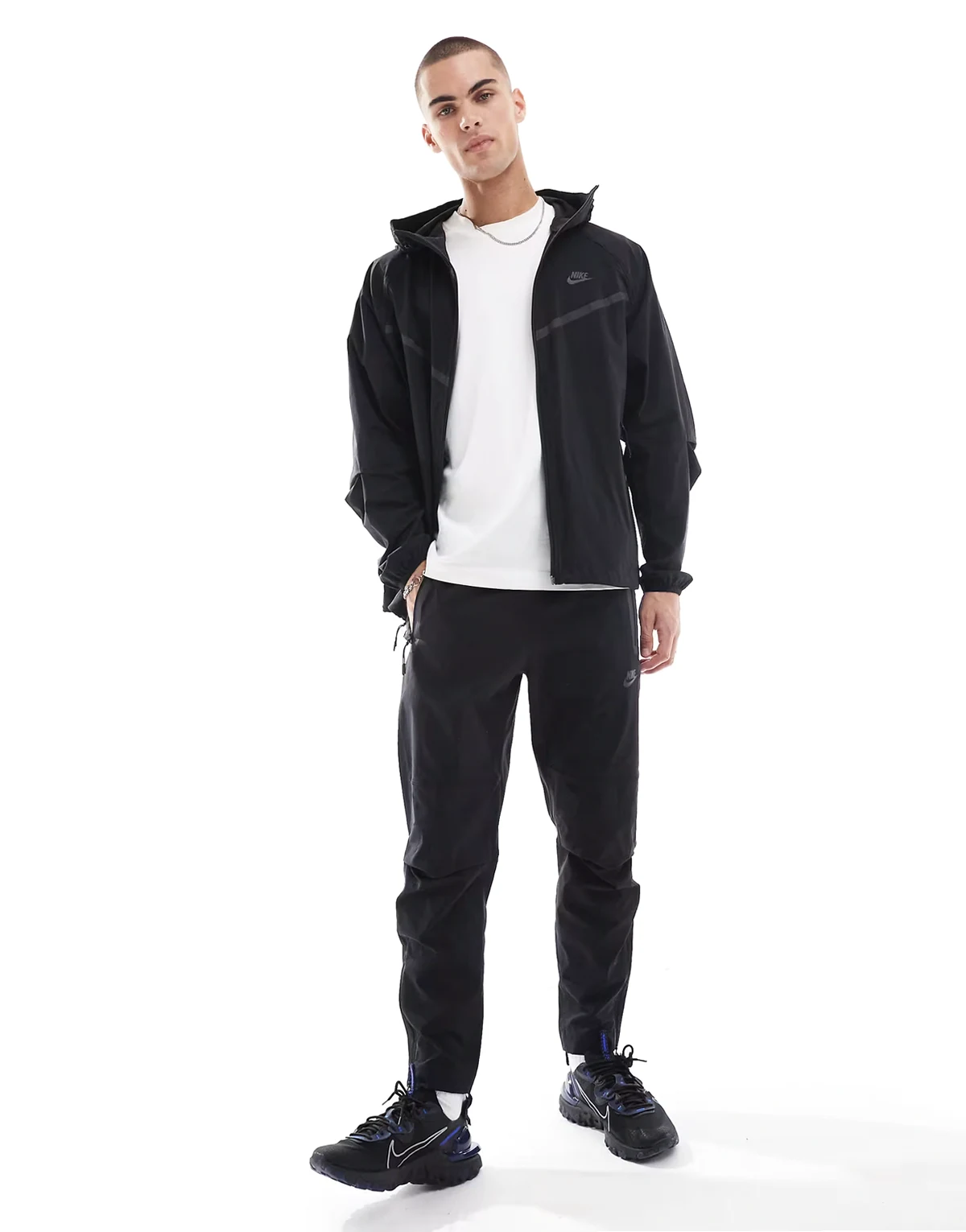 Tech Woven tapered pants in black
