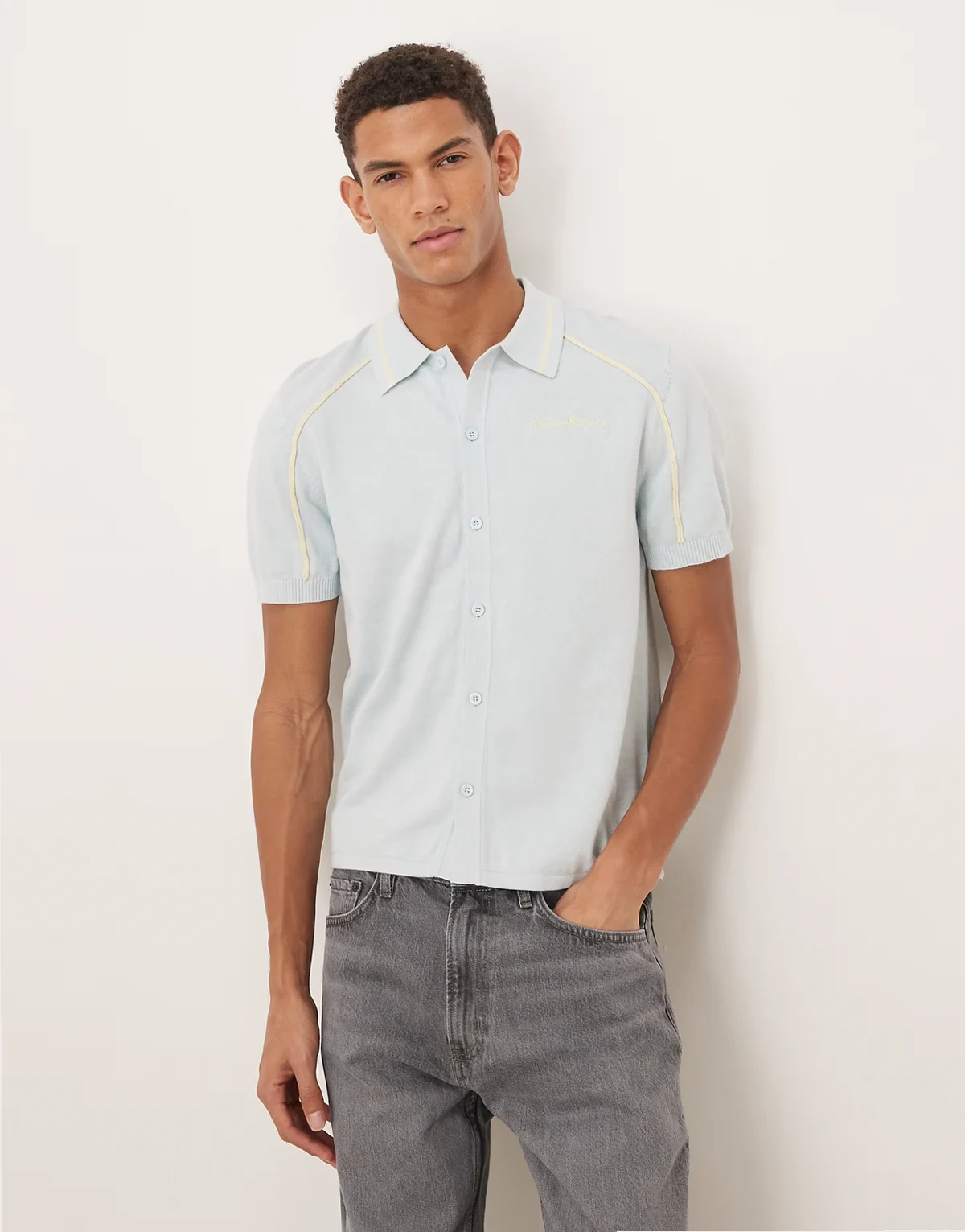 button down knit polo in sky blue