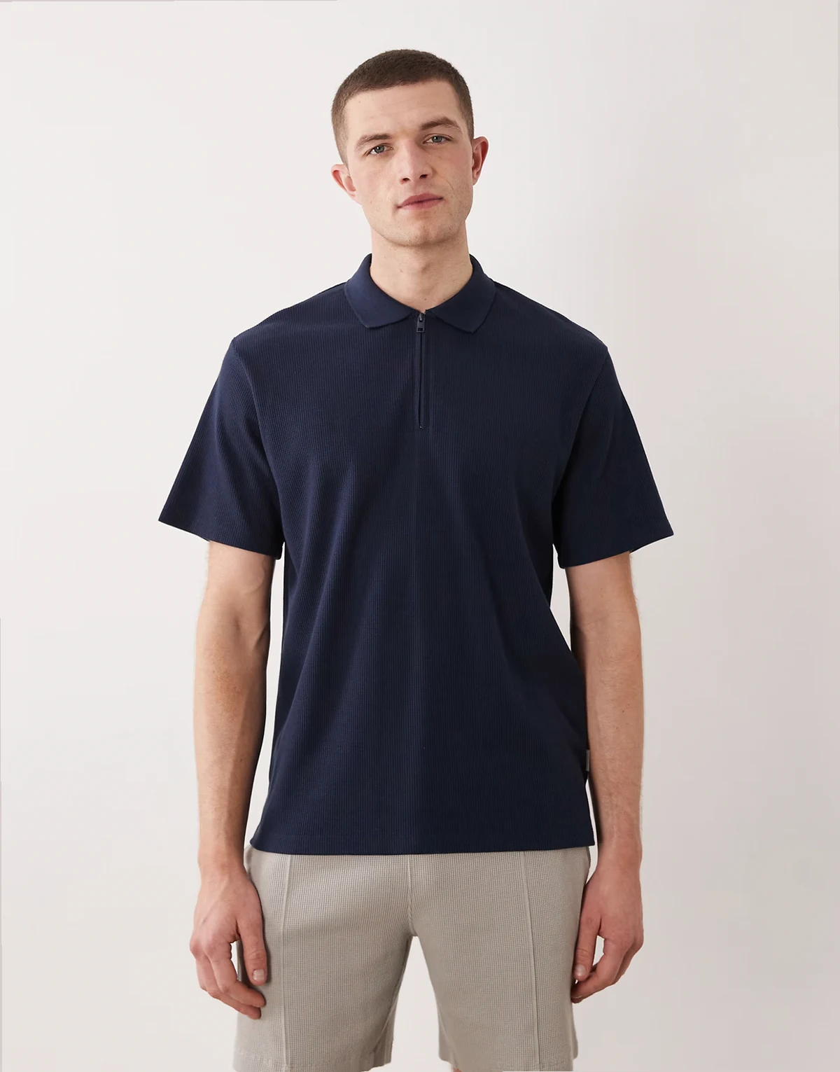 waffle knit quarter zip polo shirt in navy