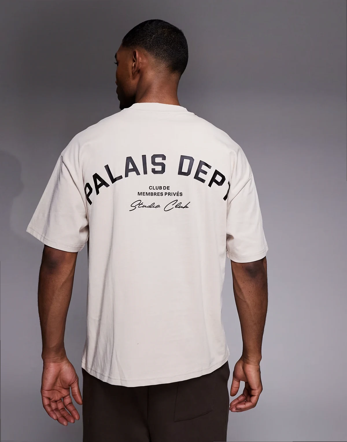 oversized t-shirt with palais dept. graphics in light stone