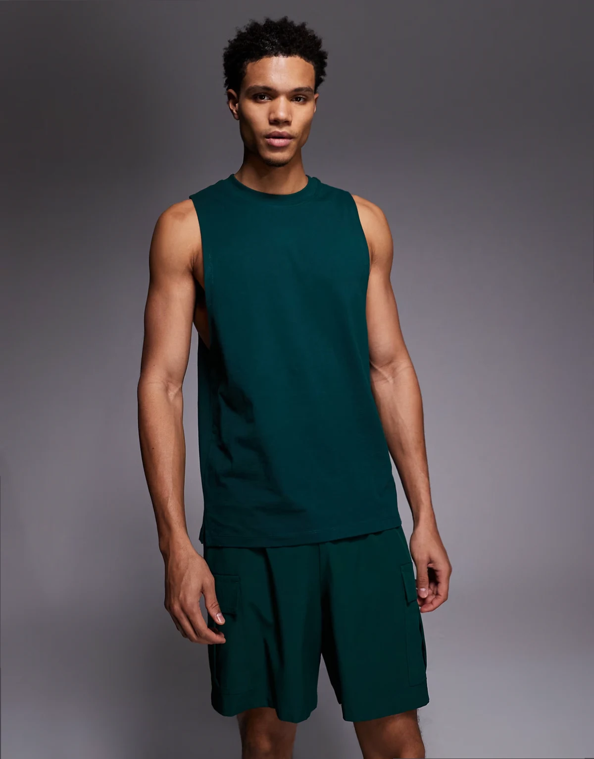 Icon cotton drop armhole training tank top with quick dry finish in bottle green