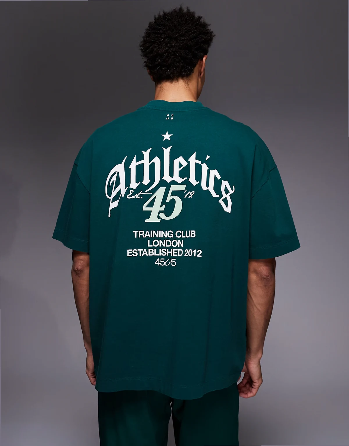 – Oversize-T-Shirt aus schwerer Baumwolle in verwaschenem Flaschengrün mit schnell trocknendem Finish und Grafik hinten