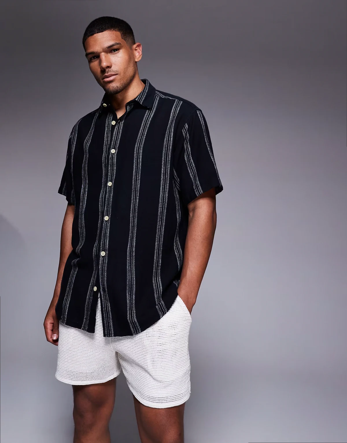 oversized short sleeve shirt in black stripes