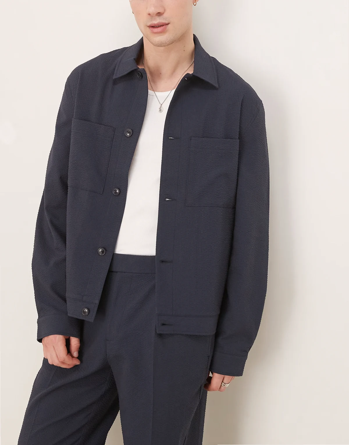 smart button harrington jacket in navy seersucker texture - part of a set