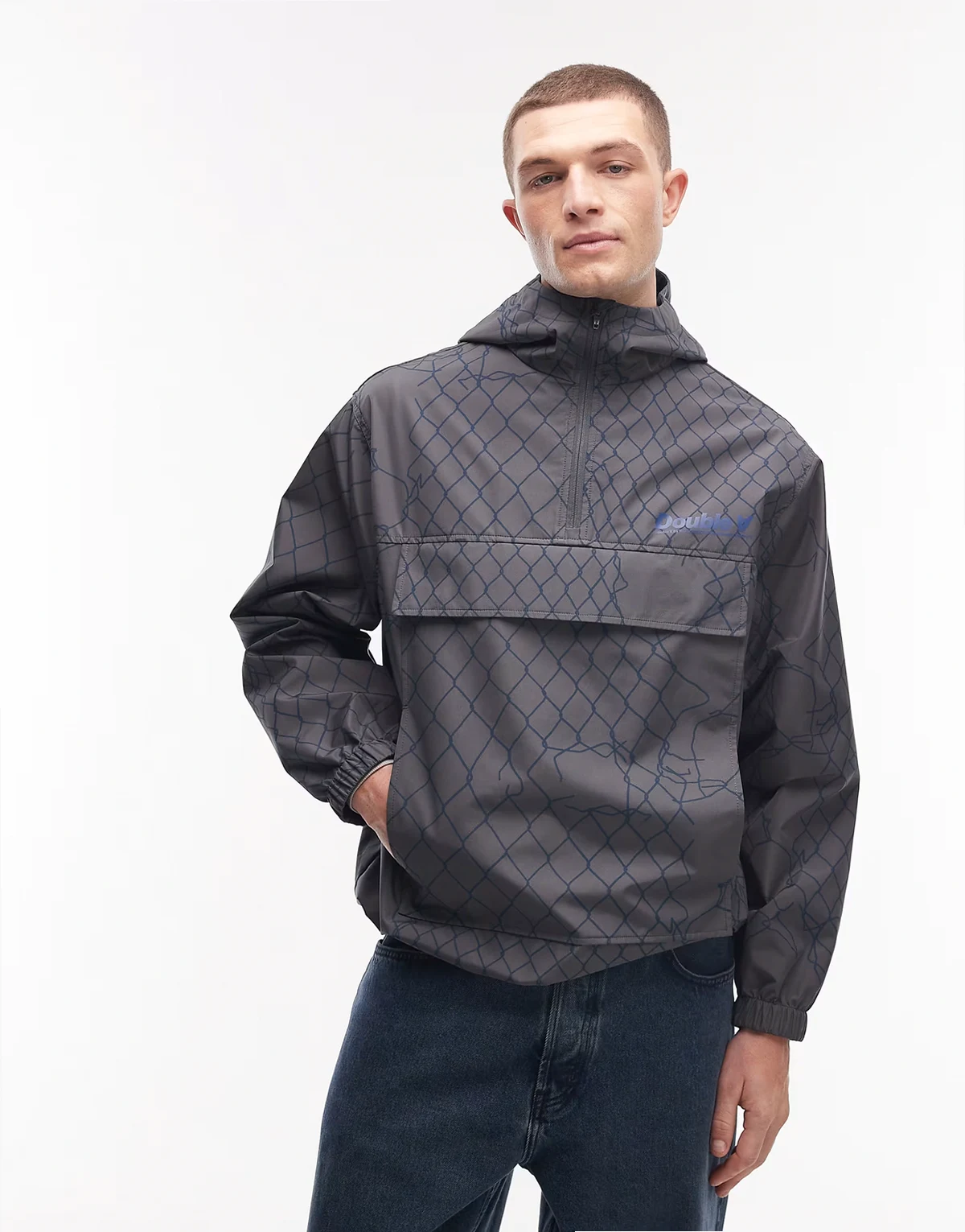 – Kimbo – Gemusterte Windjacke in Marineblau