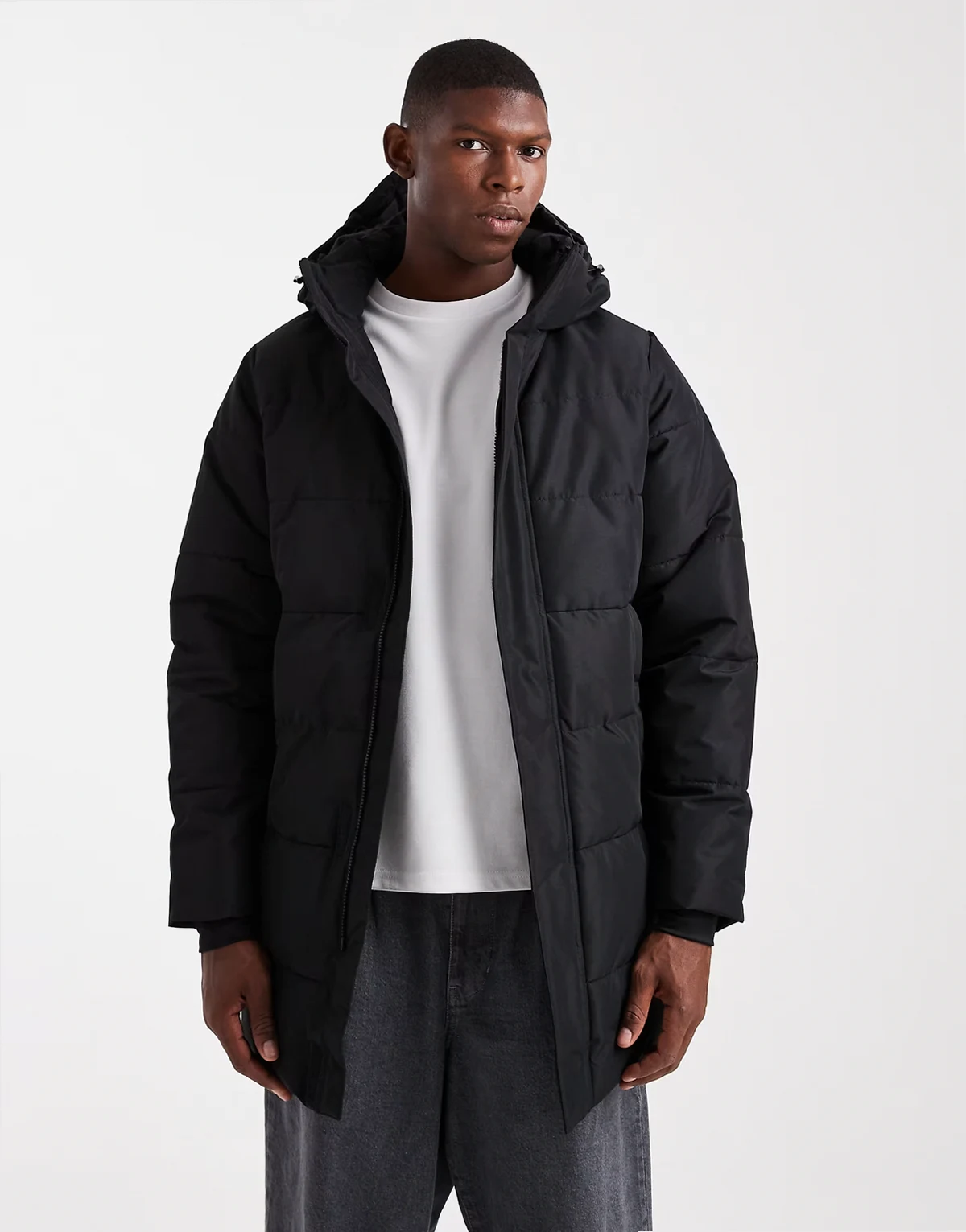 – Wasserdichter Longline-Puffermantel in Schwarz mit Kapuze
