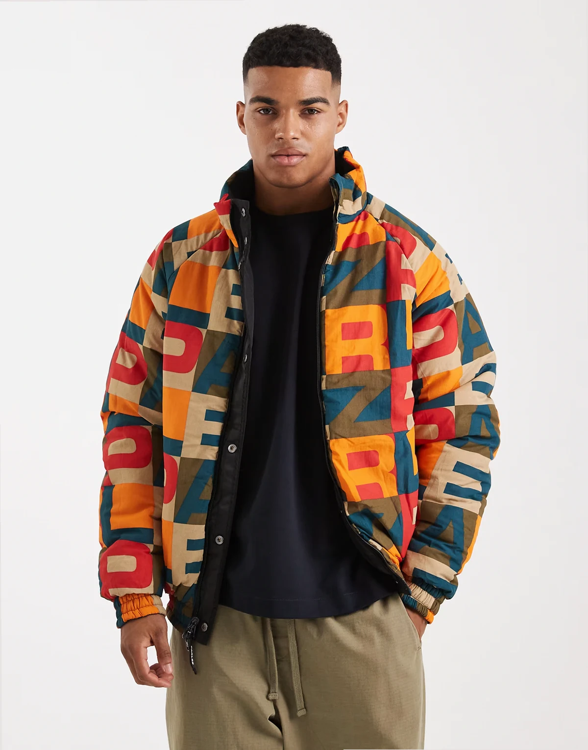 monogram logo reversible 2 way zip up puffer jacket in black/multi