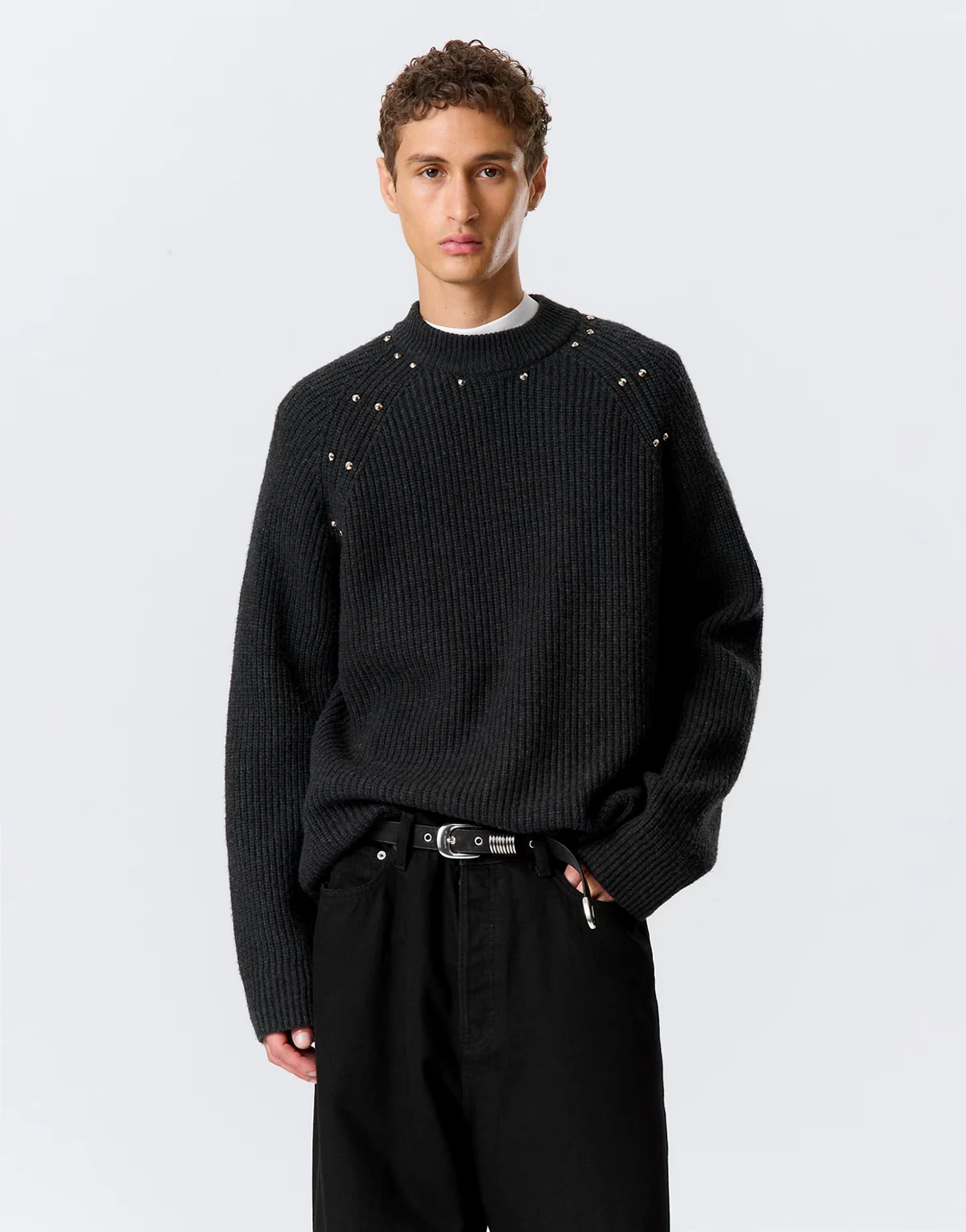 wool blend sweater with stud detail in black