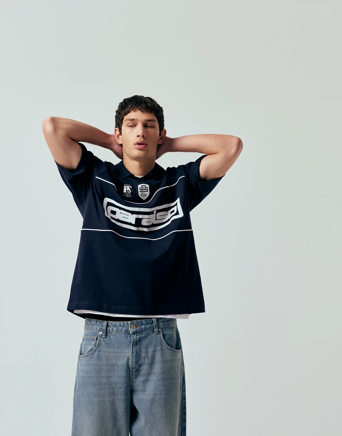 oversized polo t-shirt with panels and paraiso graphic in navy